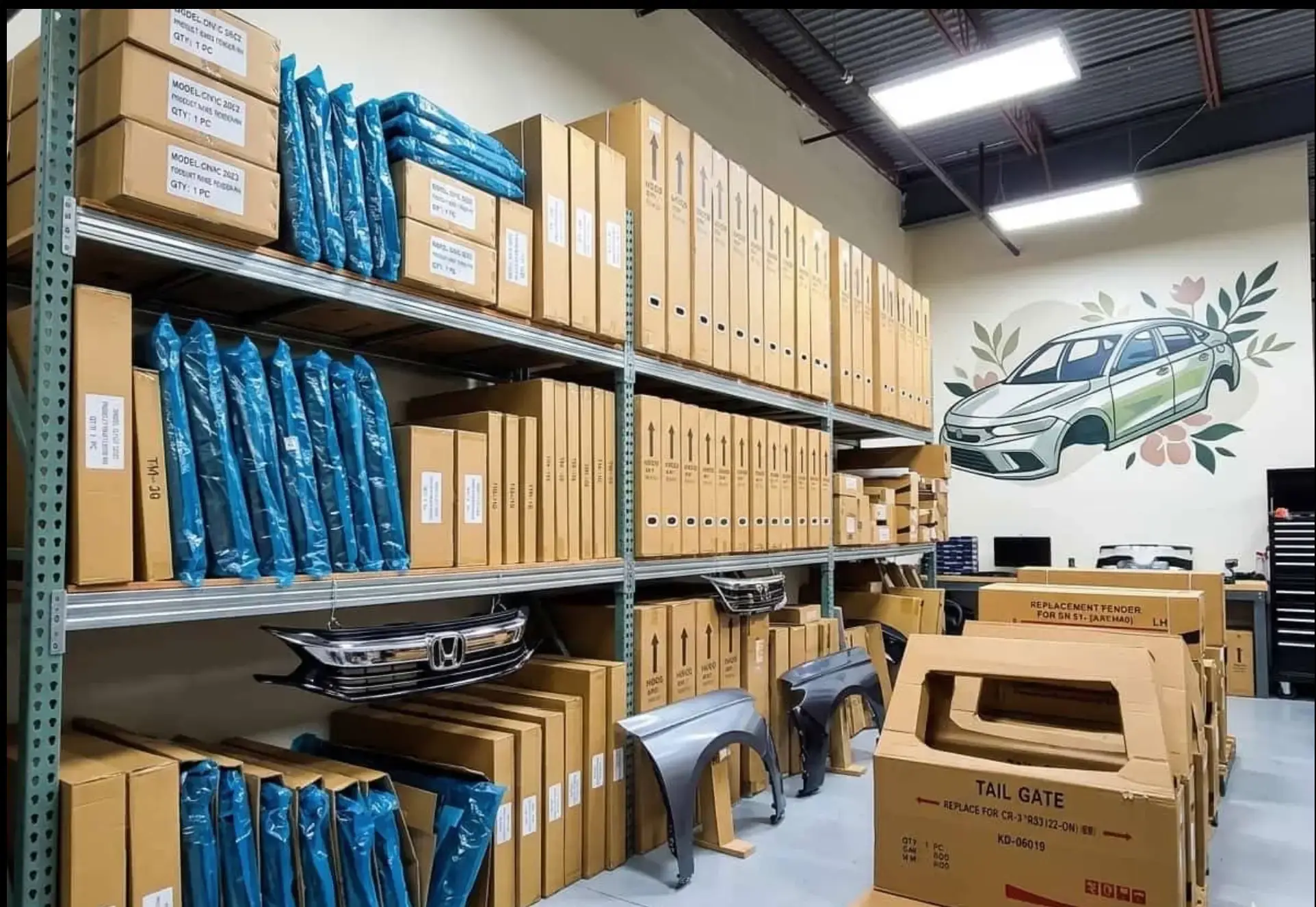 KDR warehouse shelves with packaged body panels, grilles and fenders